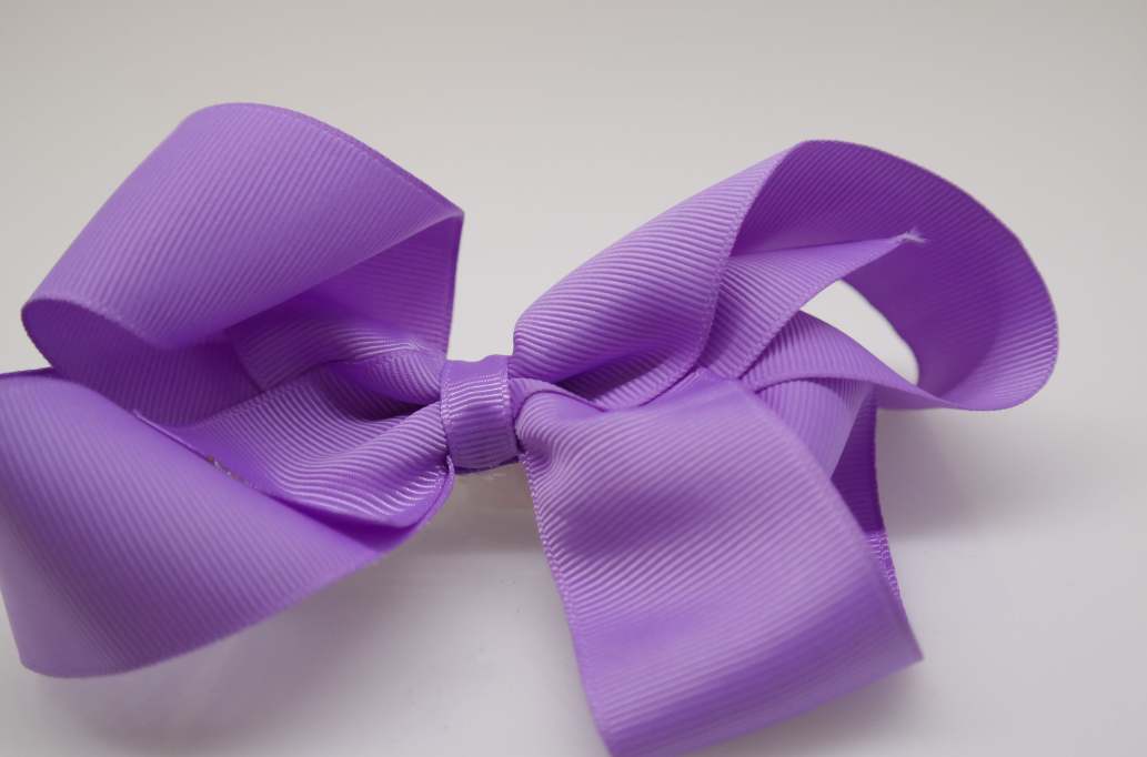 Itty bitty tuxedo hair bow Color: Hyacinth